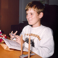 Mats Steen sitting at his desk in 'Ibelin'