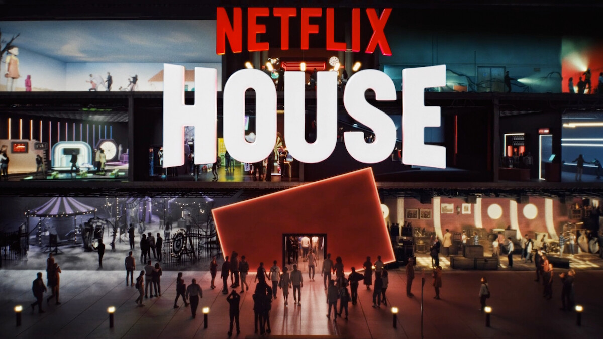 Crowds walk outside a modern, vibrant building labeled "Netflix House," with colorful rooms inside inspired by different Netflix shows.