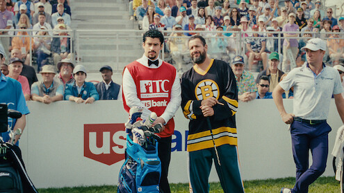 Quinn Stiller as Will Zalatoris Caddie, Benito Antonio Martínez Ocasio as Busboy, Adam Sandler as Happy Gilmore and Justin Thomas as himself in 'Happy Gilmore 2'