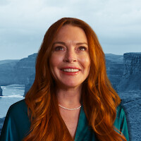 Lindsay Lohan in front of a backdrop of Ireland.