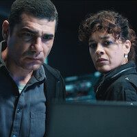 Rômulo Braga as Benício and Maeve Jinkings as Suellen in Season 2 of 'Criminal Code'