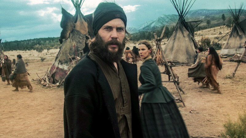 Taylor Kitsch as Issac and Betty Gilpin as Sara Rowell in 'American Primeval'
