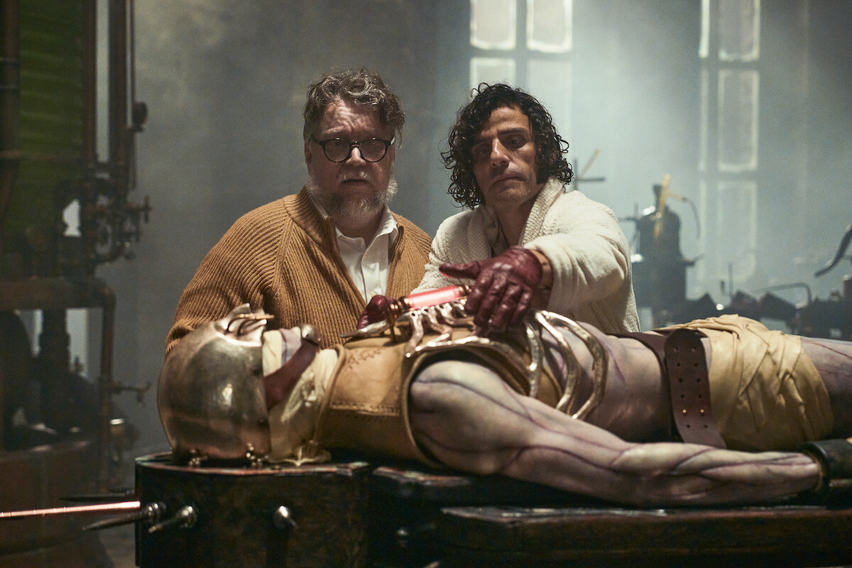 Writer/Director Guillermo del Toro, Oscar Isaac as Victor Frankenstein and Jacob Elordi as The Creature in Frankenstein.