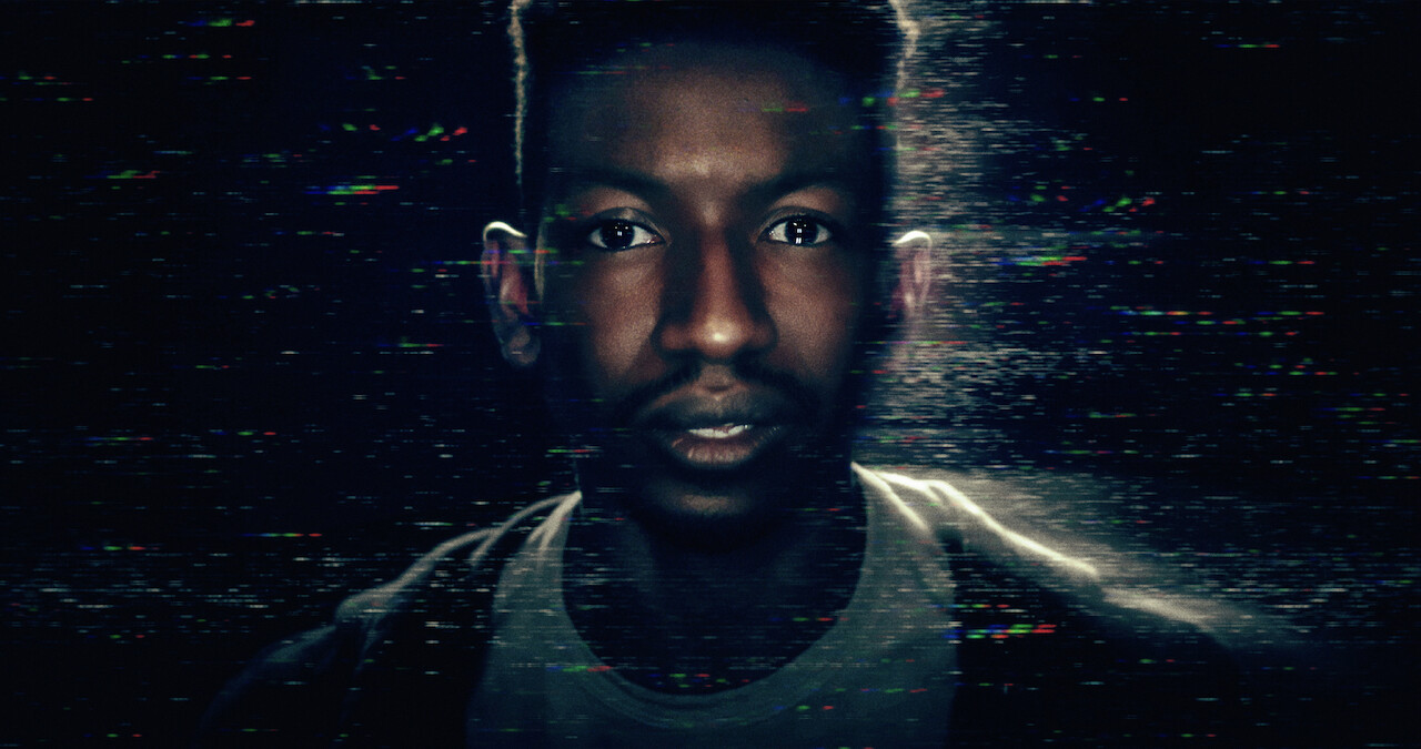 An image of Mamoudou Athie playing Dan Turner in Archive 81