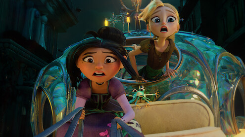 Two animated girls with surprised expressions ride in a magical, glowing carriage at night, with a small frog sitting between them in a whimsical city setting.