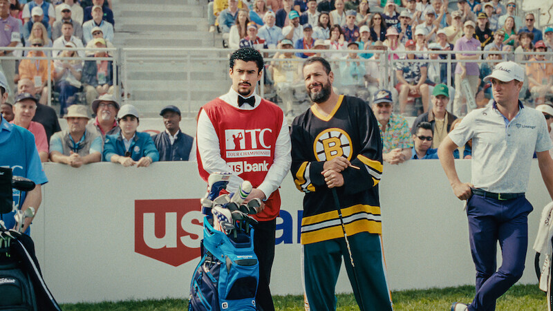 Quinn Stiller as Will Zalatoris Caddie, Benito Antonio Martínez Ocasio as Busboy, Adam Sandler as Happy Gilmore and Justin Thomas as himself in 'Happy Gilmore 2'