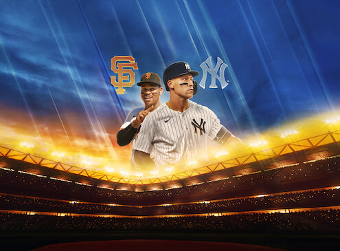 Two baseball players from the San Francisco Giants and New York Yankees pose in a brightly lit stadium with team logos and a dramatic evening sky in the background.