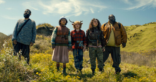 Adeel Akhtar as Singh, Naledi Murray as Wendy, Christian Convery as Gus, Stefania LaVie Owen as Becky, and Nonso Anozie as Jepperd stand on a mountainside together in season 3 of 'Sweet Tooth'