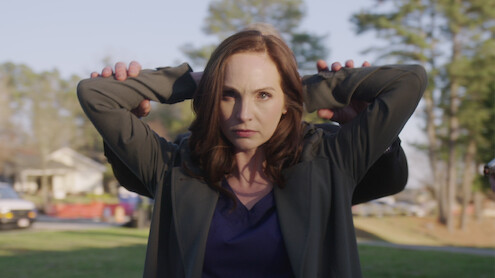 Candice King as Melanie McGuire getting arrested in 'Suitcase Killer.'