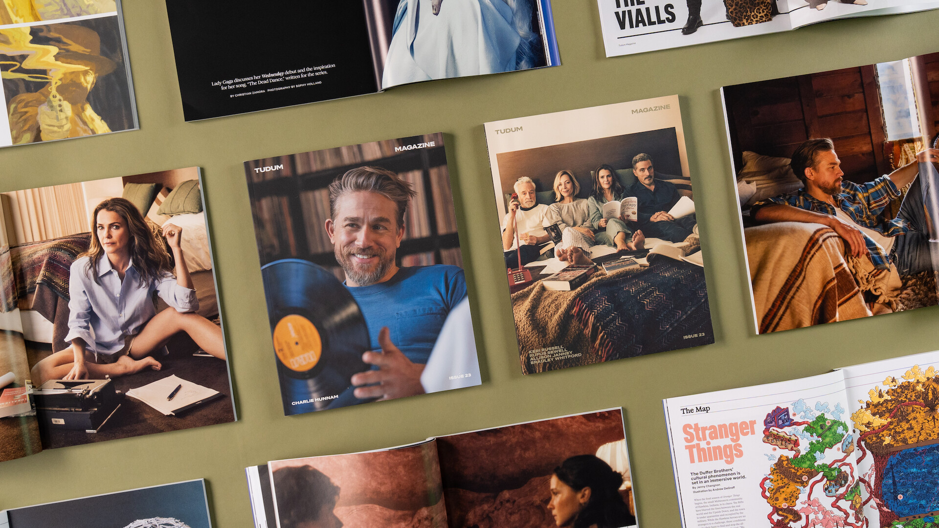 A grid of the covers and open spreads of Tudum Magazine Issue 23