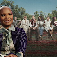Felicia Pride smiling against A Different World Cast Photo