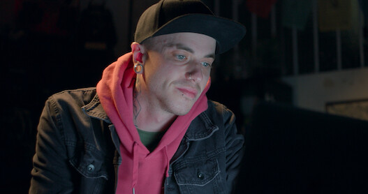 Man staring off into a screen