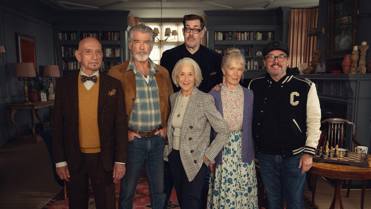 Sir Ben Kingsley as Ibrahim Arif, Pierce Brosnan as Ron Ritchie, Author Richard Osman, Helen Mirren as Elizabeth Best, Celia Imrie as Joyce Meadowcroft & Director Chris Columbus behind the scenes of 'The Thursday Murder Club'