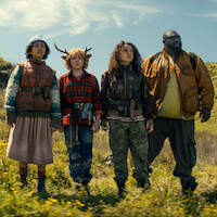 Adeel Akhtar as Singh, Naledi Murray as Wendy, Christian Convery as Gus, Stefania LaVie Owen as Becky, and Nonso Anozie as Jepperd stand on a mountainside together in season 3 of 'Sweet Tooth'