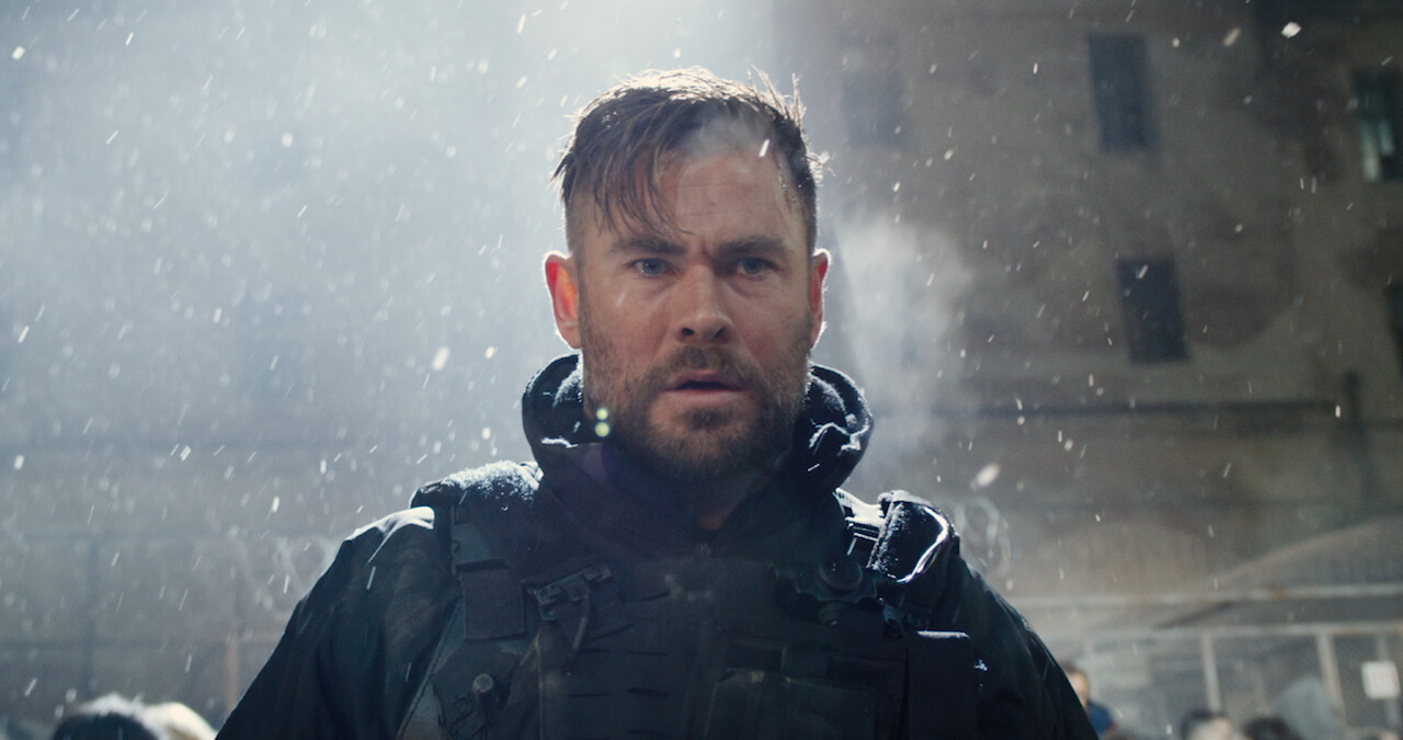 Chris Hemsworth stands alone in a still from 'Extraction 2.'