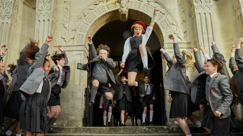 Roald Dahl's Matilda the Musical. (L to R) Charlie Hodson-Prior as Bruce Bogtrotter, Meesha Garbett as Hortensia in Roald Dahl's Matilda the Musical. Cr. Dan Smith/Netflix © 2022
