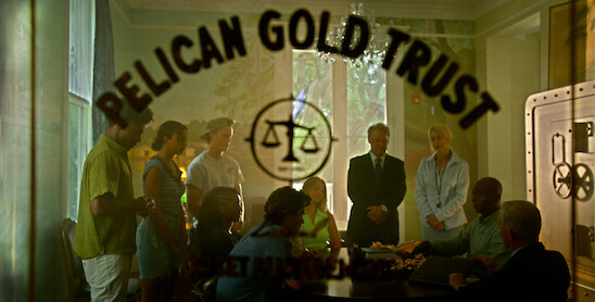 The Pogues getting their gold weighed at the Pelican Gold Trust