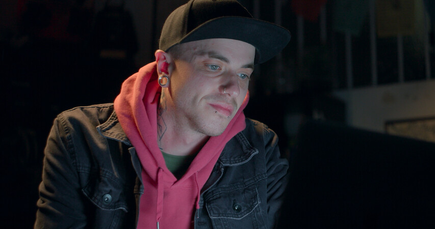 Man staring off into a screen