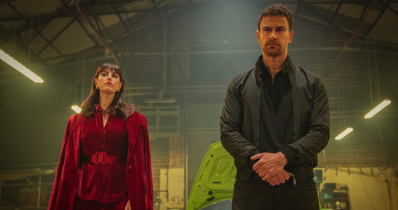 Theo James as Eddie Horniman stands in a garage in season 1 of 'The Gentlemen'