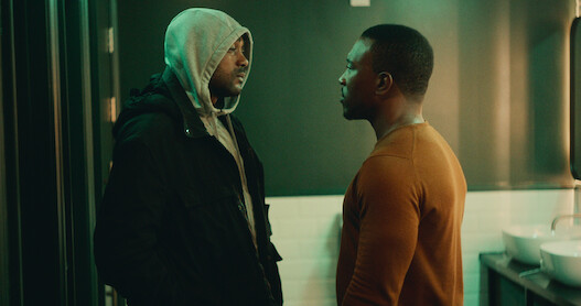 Kane Roninson as Sully and Ashley Walters as Dushane stand face to face in Season 3 of 'Top Boy.' 