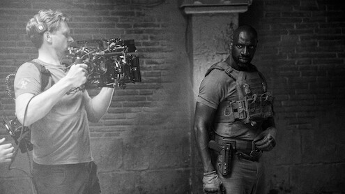 Behind the scenes image of Omar Sy on the set of 'Mercenary'