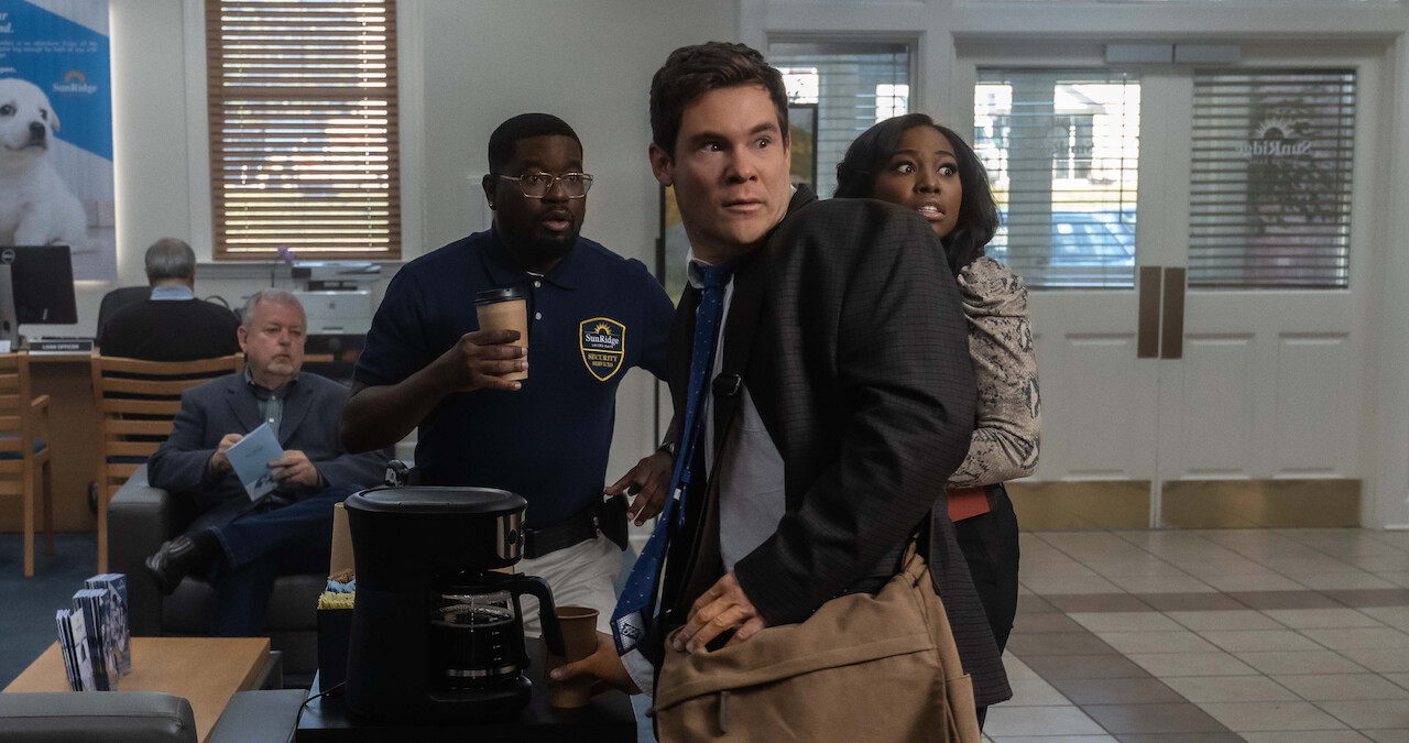 Lil Rel Howery as Tyree, Adam DeVine as Owen Browning in 'The Out-Laws'.