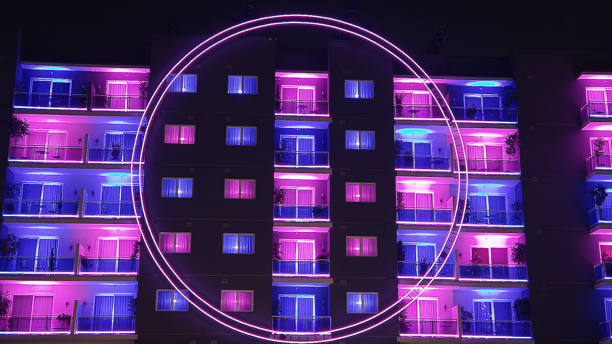 An exterior view of 'The Circle' apartments from Season 6.