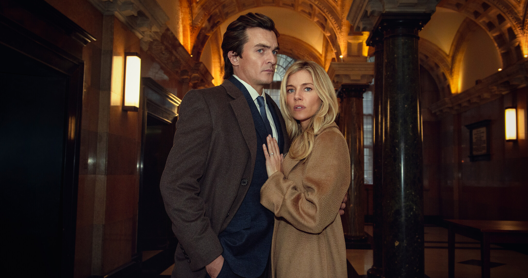 James and Sophie Whitehouse embrace each other 