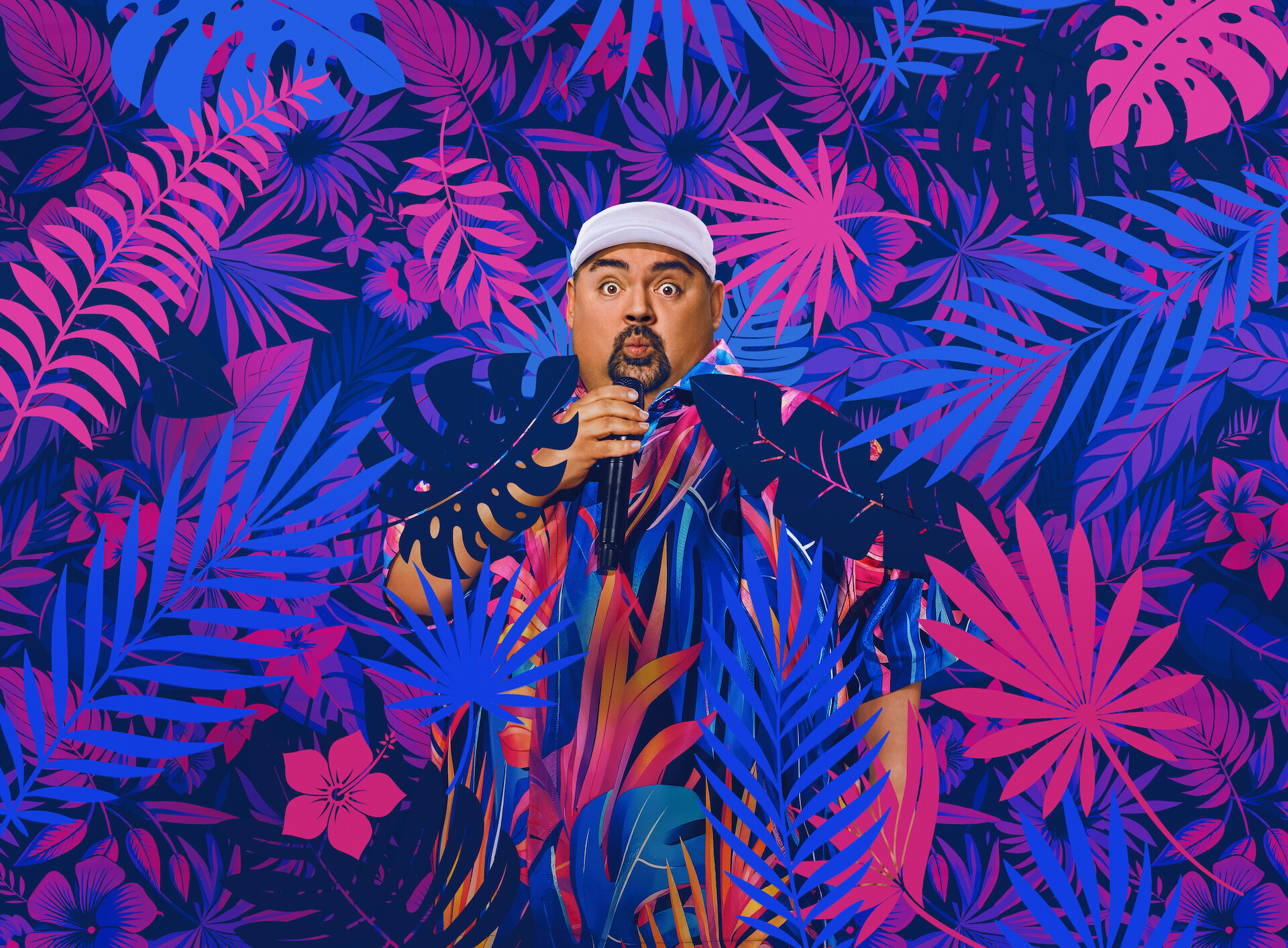 Gabriel Iglesias: Legend of Fluffy - Gabriel Iglesias surrounded by colorful ferns