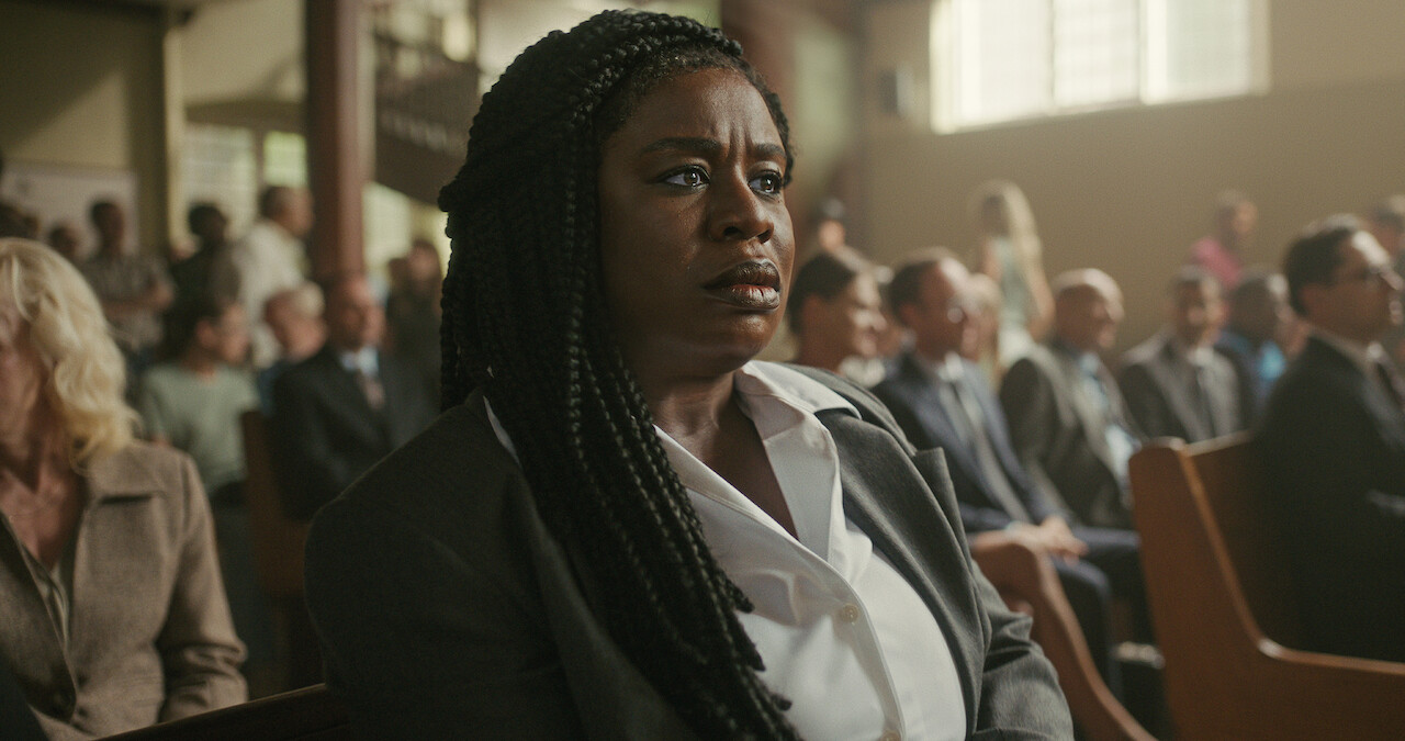 Uzo Aduba as Edie sits in a courtroom in Season 1 of 'Painkiller.'