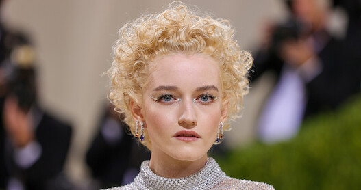 A glamour close up photo of actress Julia Garner