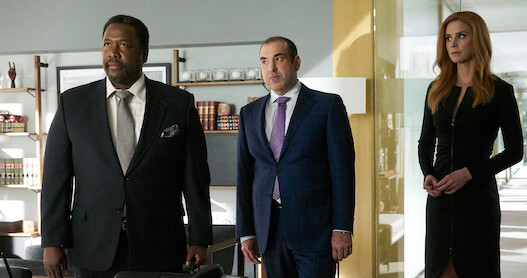 Wendell Pierce as Robert Zane, Rick Hoffman as Louis Litt and Sarah Rafferty as Donna Paulsen in Suits Season 8.