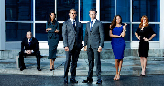 Rick Hoffman as Louis Litt, Gina Torres as Jessica Pearson, Gabriel Macht as Harvey Specter, Patrick J. Adams as Mike Ross, Meghan Markle as Rachel Zane, Sarah Rafferty as Donna Paulsen in Suits.