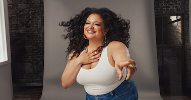 Portrait of Michelle Buteau.