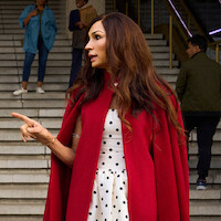 Famke Janssen as Betty, Jacob Derwig as Jack, and Elise Schaap as Majorie argue in front of the court house in 'Amsterdam Empire.'