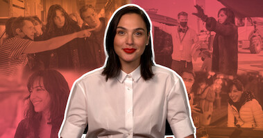 Actress Gal Gadot smiles in front of a collage of BTS images from 'Heart of Stone' film