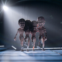 The puppet versions of Anthony Keddis, John Frusciante, Flea, and Chad Smith onstage.