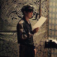 Jung Kook pictured in a recording studio in BTS: THE RETURN