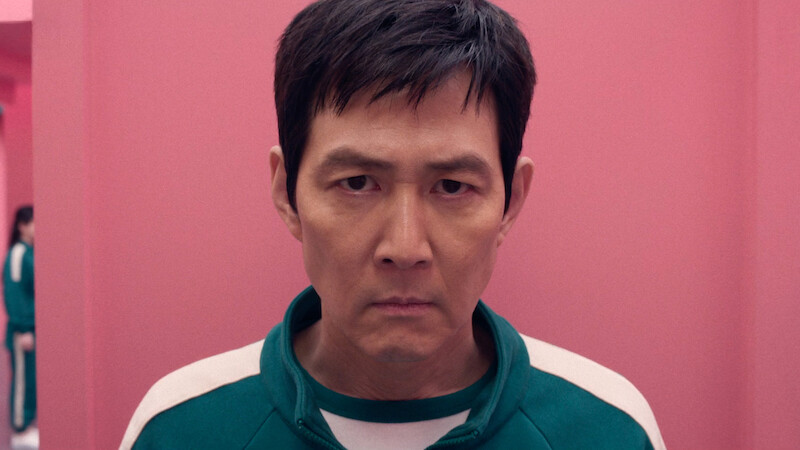  Lee Jung-jae as Seong Gi-hu looks into the camera with an angry expression in Season 2 of 'Squid Game'