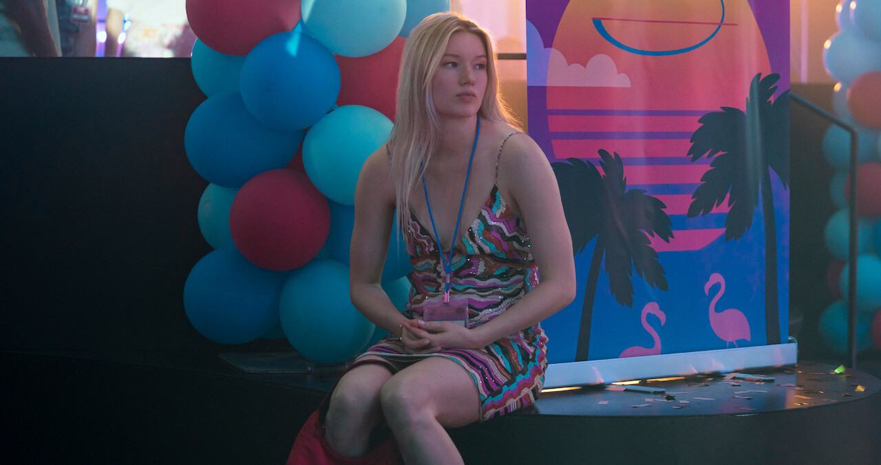 West Duchovny as Shannon Schaeffer sits alone at a party in Season 1 of 'Painkiller.'