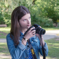 Anna Kendrick holds a camera in 'A Simple Favor'