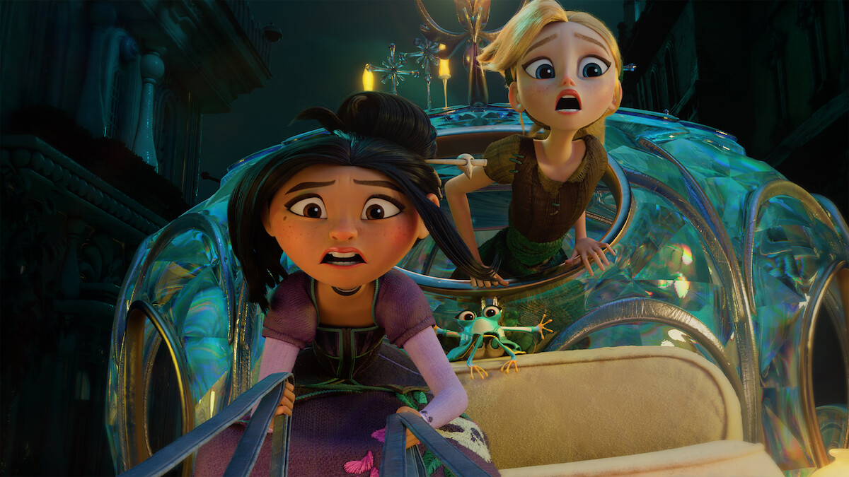 Two animated girls with surprised expressions ride in a magical, glowing carriage at night, with a small frog sitting between them in a whimsical city setting.