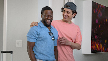 Two men smiling and laughing in the movie 72 Hours