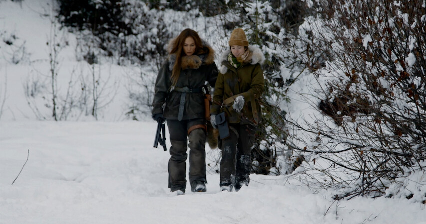 Jennifer Lopez and Lucy Paez walking in snow