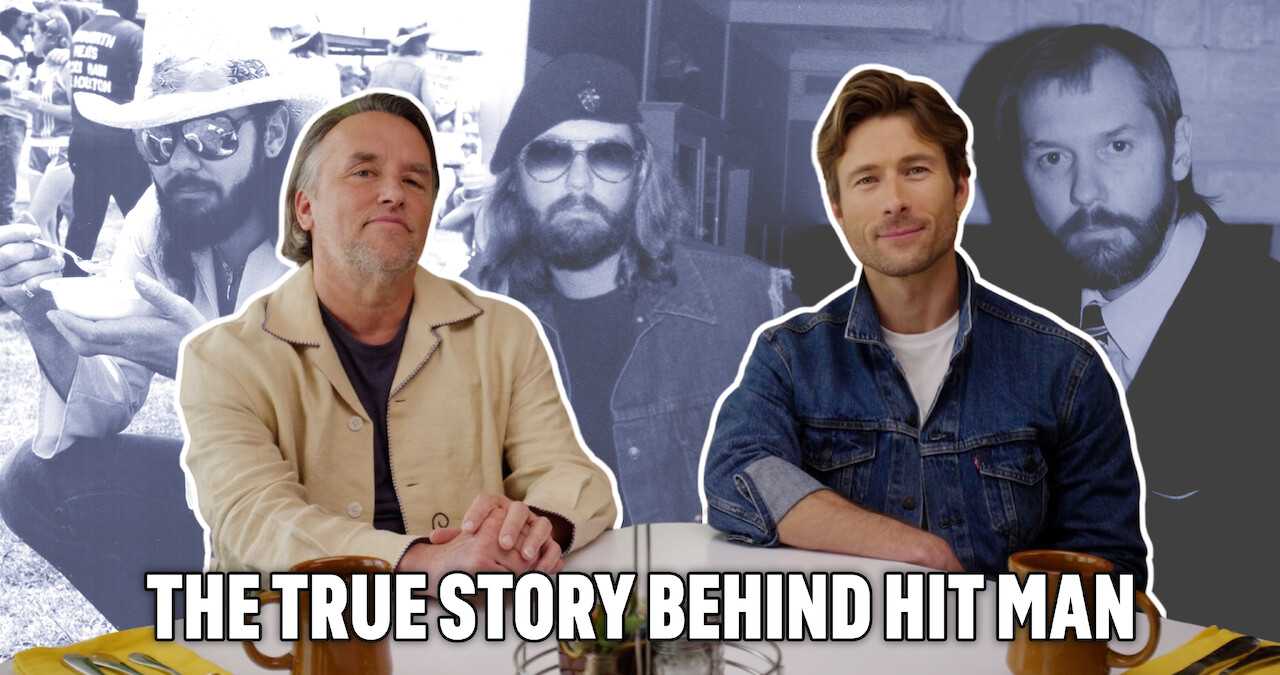 Richard Linklater, left, sitting at a diner table with Glen Powell. The backdrop is photos of the real Gary Johnson.