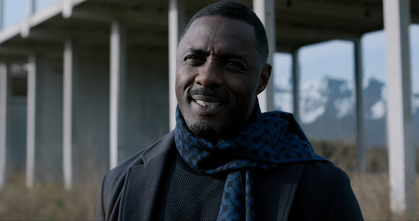 Idris Elba smiles in a still from 'Extraction 2.'