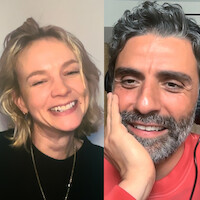 Carey Mulligan and Oscar Isaac smiling in a split-screen video call; each in their own indoor setting.