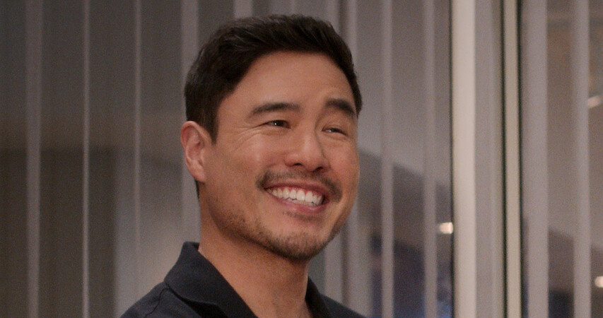 Man smiling with mustache