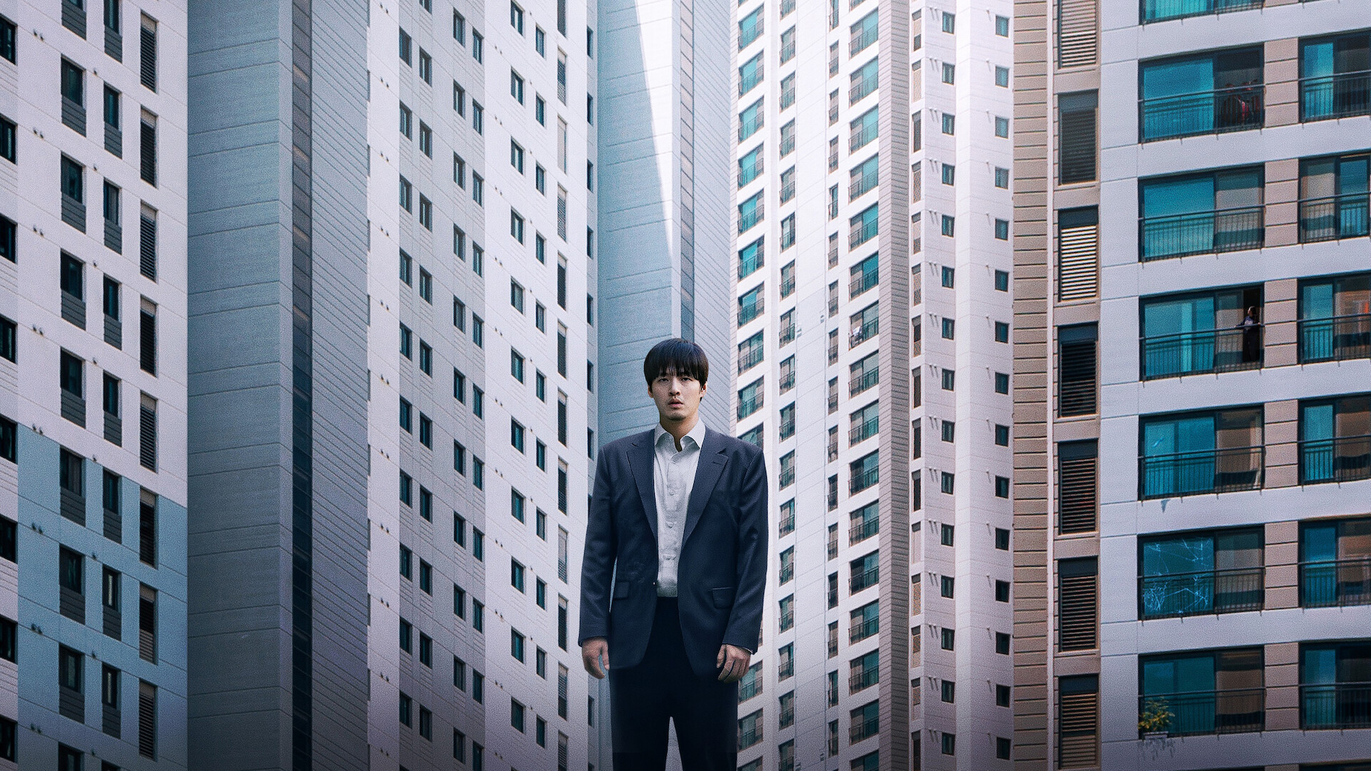 Wall to Wall - A character standing in front of an impossibly tall skyscraper