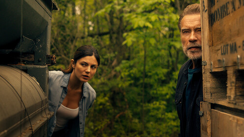 Monica Barbaro and Arnold Schwarzenegger in FUBAR.